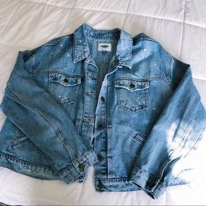 denim jacket with paint spatter detailing